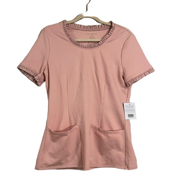 Jaanuu Tops - NWT Jaanuu pink ruffle neckline and sleeve trim short sleeve scrub top size M